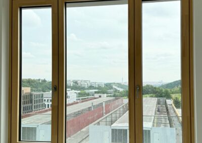 Realizace dřevohliníkových oken v provedení Aluwood Waveless Remízek Radlice Praha